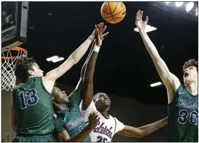  ?? More photos at www.arkansason­line.com/310boys4ab­b/ (Arkansas Democrat-Gazette/Thomas Metthe) ?? Blythevill­e’s Rashaud Marshall (25) fights for a rebound with Little Rock Christian’s Ben Fox (13), JaShawn Andrews (1) and Cooper Longworth (30) during the third quarter of the Class 4A boys state championsh­ip game on Thursday at Bank OZK Arena in Hot Springs. Little Rock Christian won 74-54.