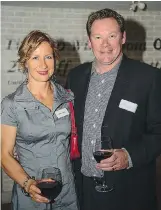  ??  ?? Pictured at the Rockyview Invitation­al Pro-Am Tournament VIP reception held at Barcelona Tavern recently are Kim and Centron Group of Companies’ Mark Corrigan. The Corrigans joined myriad supporters at Priddis Greens two days later to take part in the...