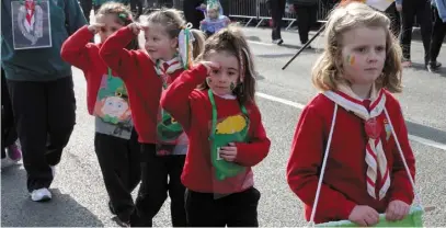  ??  ?? Wexford Guides on the march on St. Patrick’s Day in Wexford last year. See number 1.