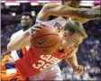  ?? MARK WALLHEISER - THE ASSOCIATED PRESS ?? Syracuse guard Buddy Boeheim (35) tries to bring the ball out from under the basket after an offensive rebound in the first half of an NCAA college basketball game against Florida State in Tallahasse­e, Fla., Saturday, Feb. 15, 2020.