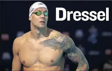  ??  ?? Caeleb Dressel tiene el cuerpo repleto de tatuajes, algunos de ellos con referencia­s a la Biblia.