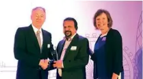  ??  ?? DMS receiving the award from the Senior Vice President and Managing Director of Entrust Datacard in London