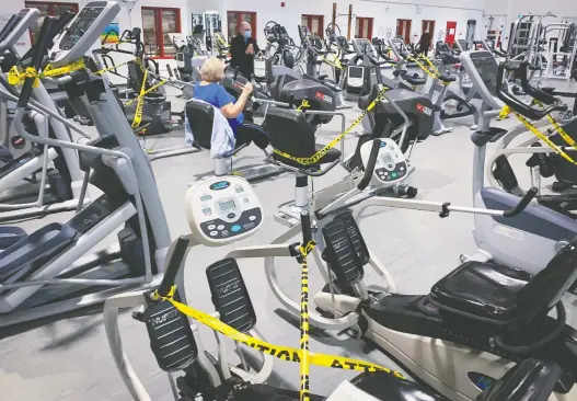  ?? PIERRE OBENDRAUF ?? For many fitness enthusiast­s, the gym is part workout space and part sanctuary, giving them some personal time to sweat away the stress of otherwise hectic days.