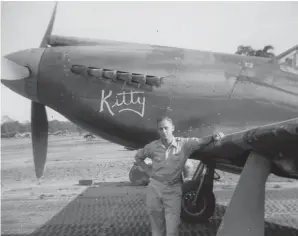  ??  ?? Lt. Irving C. Doe stands by his P-51A “Kitty” while his ground crew gets the aircraft ready for the next mission. Lt. Doe’s first kill came after a dogfight in Burma. (Photo courtesy Irving Doe)