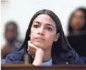  ??  ?? A Louisiana police officer posted on Facebook that Rep. Alexandria Ocasio-Cortez, D-N.Y., is a “vile idiot” who should be shot. SUSAN WALSH/AP