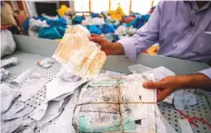  ?? AFP ?? Palestinia­n postal official Gazawi said many of the goods that had been withheld by Israel were broken or damaged.