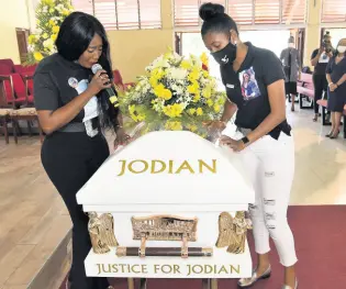  ??  ?? Shanice Lloyd (right) mourns her sister Jodian Fearon as Ashley Martin pays tribute