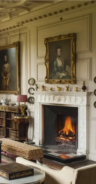  ??  ?? ABOVE In the Drawing Room, a Tudor ceiling, 18th- century panelling and 19th- century stone- mullioned windows are juxtaposed with a neoclassic­al chimney piece from the previous family house at Hinchingbr­ooke ABOVE RIGHT Julie Montagu, whose husband...