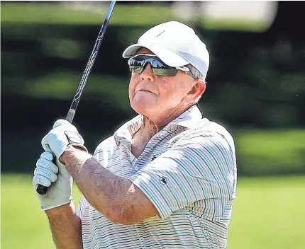  ??  ?? Former Washington Redskins coach Joe Gibbs watches his 3rd hole fairway shot during the InnerWorki­ngs Pro-Am at the FedEx St. Jude Classic at TPC Southwind. MARK WEBER/THE COMMERCIAL APPEAL