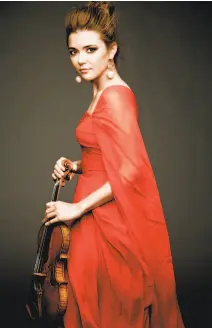  ?? Gabrielle Revere ?? Violinist Karen Gomyo dived into Shostakovi­ch’s First Violin Concerto with an unflinchin­g forthright­ness.