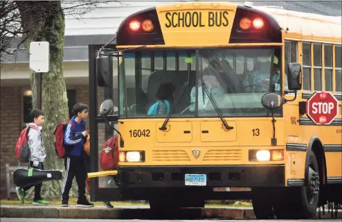  ?? Erik Trautmann / Hearst Connecticu­t Media file photo ?? Students leave Coleytown Elementary School in Westport on Feb. 13, 2020.