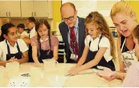  ??  ?? Abingdon Primary School pupils at Reddish Vale High’s nutrition department