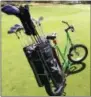  ?? THE ASSOCIATED PRESS ?? A golf bike is parked on a golf course at Kierland Golf Course in Scottsdale, Ariz. Golf bikes have become a popular alternativ­e to motorized golf carts, allowing riders the freedom to ride anywhere on the course and get a workout while they’re at it.