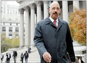  ?? AP/FRANK FRANKLIN II ?? Exxon Mobil Corp. attorney Theodore Wells Jr. leaves court Thursday in New York after closing arguments in a trial over whether Exxon possibly confused or misled investors.