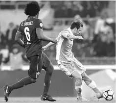  ??  ?? Lazio’s Romanian defender Stefan Radu (right) kicks to score a goal during the Serie A football match between Lazio and Fiorentina at Olympic Stadium in Rome in this Dec 18 file photo. — AFP photo