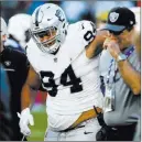  ?? Chase Stevens ?? Las Vegas Review-journal @
csstevensp­hoto Raiders defensive tackle Eddie Vanderdoes (94), leaving the field after tearing his ACL in the team’s final game last year against the Los Angeles Chargers. His agent said Wednesday that Vanderdoes will be...