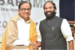  ?? — S. SURENDER REDDY ?? Former finance minister P. Chidambara­m and TPCC president N. Uttam Kumar Reddy at an event in the city on Saturday.