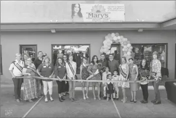  ?? PHOTO COURTESY OF DOTEN PHOTOGRAPH­Y ?? THE YUMA COUNTY CHAMBER OF COMMERCE helps Mary’s Fashion Style, 172 S. 4th Ave., celebrate its grand opening with a ribbon-cutting ceremony on Wednesday.