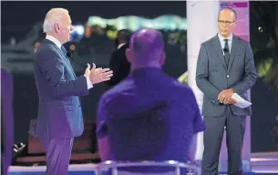  ?? ANDREW HARNIK THE ASSOCIATED PRESS ?? Democrat Joe Biden, left, speaks at a NBC town hall last week. He was supposed to meet with U.S. President Donald Trump Thursday in Miami.