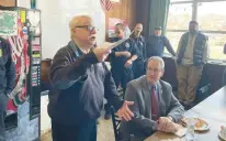  ?? COURTESY ?? Outgoing Meriden Assistant Chief Robert Burdick gives a speech at his retirement sendoff at the firehouse on Pratt Street in Meriden.