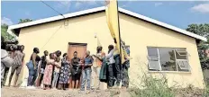  ?? EThekwini Municipali­ty ?? MXOLISI Kaunda, eThekwini mayor, handed over the keys to a house in uMlazi to a 76-year-old flood victim, Ntombinjan­i Ndawonde. |