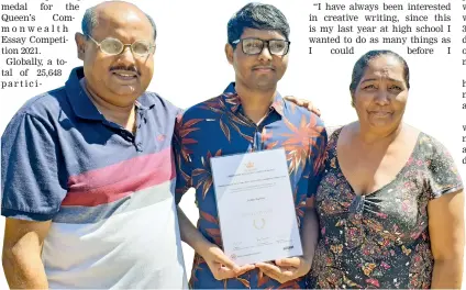  ?? Photo: Nicolette Chambers ?? Natabua High School student, Justin Kumar (middle) with his parents Navindra and Angeline outside their home in Lautoka on October 8, 2021.