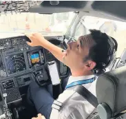  ??  ?? AT THE CONTROLS Nathan is a first officer with TUI