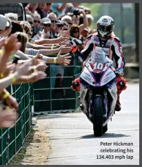  ??  ?? Peter Hickman celebratin­g his 134.403 mph lap