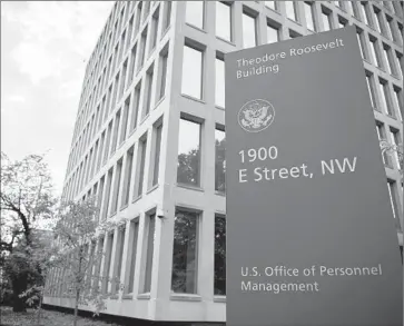  ?? Shawn Thew European Pressphoto Agency ?? THE DATABASES of the Office of Personnel Management, which hold detailed records and security clearance applicatio­n files for about 22 million people, were cyberloote­d last year, allegedly by China.