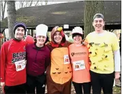  ?? JESI YOST — FOR MEDIANEWS GROUP ?? Friends dressed as a Thanksgivi­ng dinner run in the Boyertown Turkey Trot 5k. Adam Gilbert as cranberry sauce, Sydney Gilbert as a chef, Emily Gilbert as a turkey, Erica Luongo as sweet potatoes, and Rob Sahin as mac & cheese.