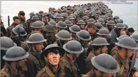  ?? PHOTO COURTESY OF WARNER BROS. PICTURES ?? British troops stranded on the coast of France during World War II await an English Channel evacuation in “Dunkirk.”