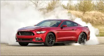  ??  ?? The current Ford Mustang is a little lower, a little wider and a little more aggressive in appearance.