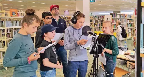  ?? ARCHIVFOTO: ANGELA WILMS-ADRIANS ?? Axel Tillmanns wird auch in diesem Jahr wieder Kids zur Ohrenbibli­othek einladen.