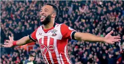  ?? — AP ?? Southampto­n’s Nathan Redmond celebrates after scoring against Liverpool in their League Cup semifinal first leg at St Mary’s Stadium in Southampto­n on Wednesday. The hosts won 1-0.