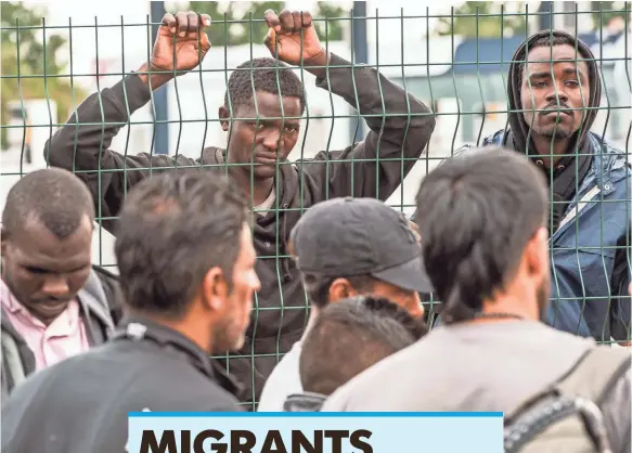  ?? PHILIPPE HUGUEN, AFP/GETTY IMAGES ?? Migrants from “The Jungle” camp have been denied access to a bus that heads to a welcome and orientatio­n center in Calais. Authoritie­s try to keep refugees from reaching nearby ports or roads.