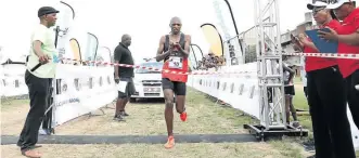  ?? / THULANI MBELE ?? Bonginkosi Zwane improved last year’s winning time, albeit on a tough route.