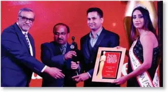  ??  ?? The award was given to Travel Boutique Online and received by Ramen Ch Das, Sales Manager – Assam &amp; Meghalaya