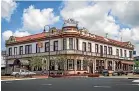  ?? GRANT MATTHEW/STUFF ?? The Feilding Hotel has dominated Manchester Square since 1875, but faces an uncertain future.