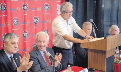  ?? ROBERTO E. ROSALES/JOURNAL ?? Dreamstyle Remodeling CEO Larry Chavez, standing, speaks at a May 3 press conference anouncing the $10 million naming rights deal.