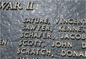  ?? DAN JANISSE ?? The name of Vincent Sature is among the veterans memorializ­ed on a Royal Canadian Air Force monument in Dieppe Park in Windsor.