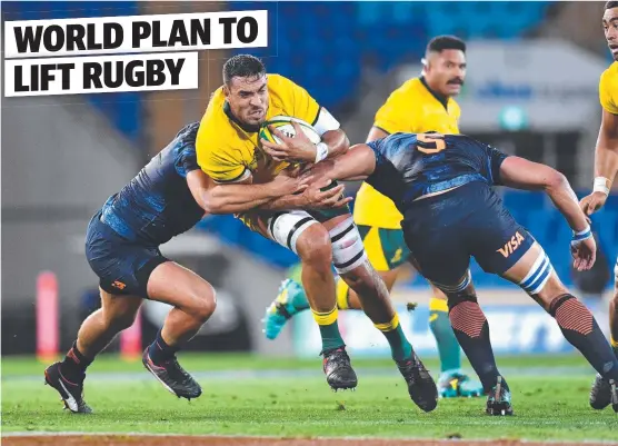  ?? BONUS BID: Wallabies player Rory Arnold ( centre) in action against Argentina on the Gold Coast. ??