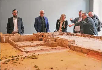  ?? Jerry Lara/staff photograph­er ?? Dignitarie­s view a diorama of restoratio­n during a sneak preview of the Alamo Collection­s Center in November 2022. An event highlighti­ng Mexican soldiers has been reset for May after complaints.