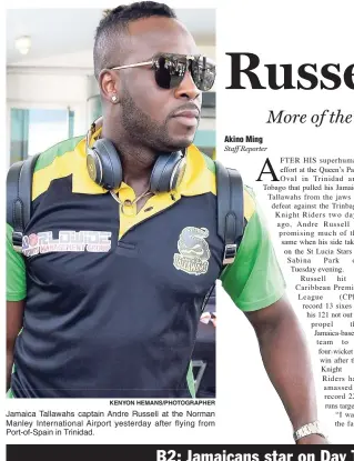  ?? KENYON HEMANS/PHOTOGRAPH­ER ?? Jamaica Tallawahs captain Andre Russell at the Norman Manley Internatio­nal Airport yesterday after flying from Port-of-Spain in Trinidad.