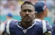  ?? LYNNE SLADKY — THE ASSOCIATED PRESS FILE ?? In this Sunday file photo, New England Patriots wide receiver Antonio Brown (17) on the sidelines,during the first half at an NFL football game against the Miami Dolphins in Miami Gardens, Fla. The Patriots released Brown on Friday.