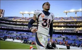  ?? AARON ONTIVEROZ — THE DENVER POST ?? Justin Simmons of the Denver Broncos jogs off the field after the fourth quarter of the Baltimore Ravens’ 10-9win at M&T Bank Stadium in Baltimore on Dec. 4.