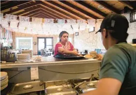  ?? MONTINIQUE MONROE/THE NEW YORK TIMES ?? Marisela Godinez, owner of El Meson Tequilera in Texas, used to send leftover food to the landfill.