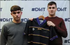  ??  ?? Conor Garland receives his jersey from Niall Kearns.