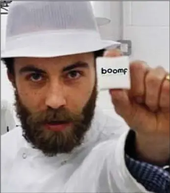  ??  ?? Keeping it sweet: James Middleton holds one of his Boomf marshmallo­w creations