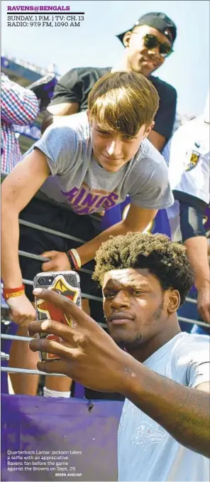  ?? BRIEN AHO/AP ?? Quarterbac­k Lamar Jackson takes a selfie with an appreciati­ve Ravens fan before the game against the Browns on Sept. 29.