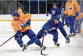  ?? Kevin Hoffman / Getty Images ?? Sabres forward Jeff Skinner, skating during training camp, will be reunited with former Hurricance­s teammate Eric Staal for this season.